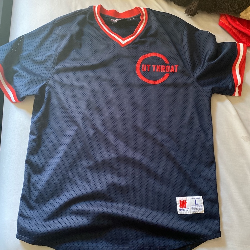 Undefeated Navy blue jersey